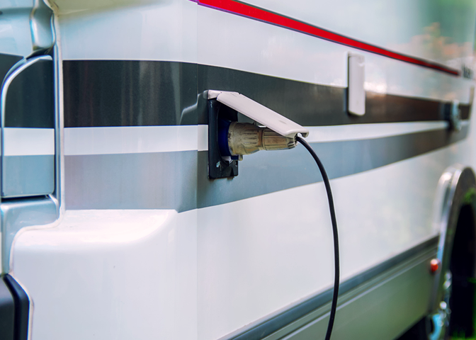 RV hooked up to electricity.