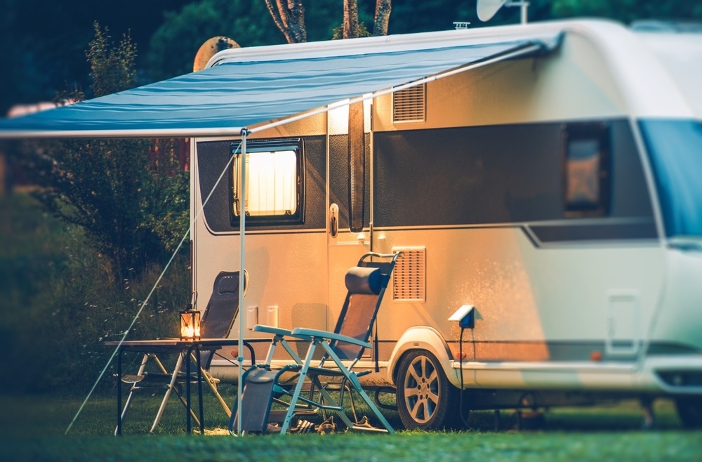 RV at dusk with awning extended